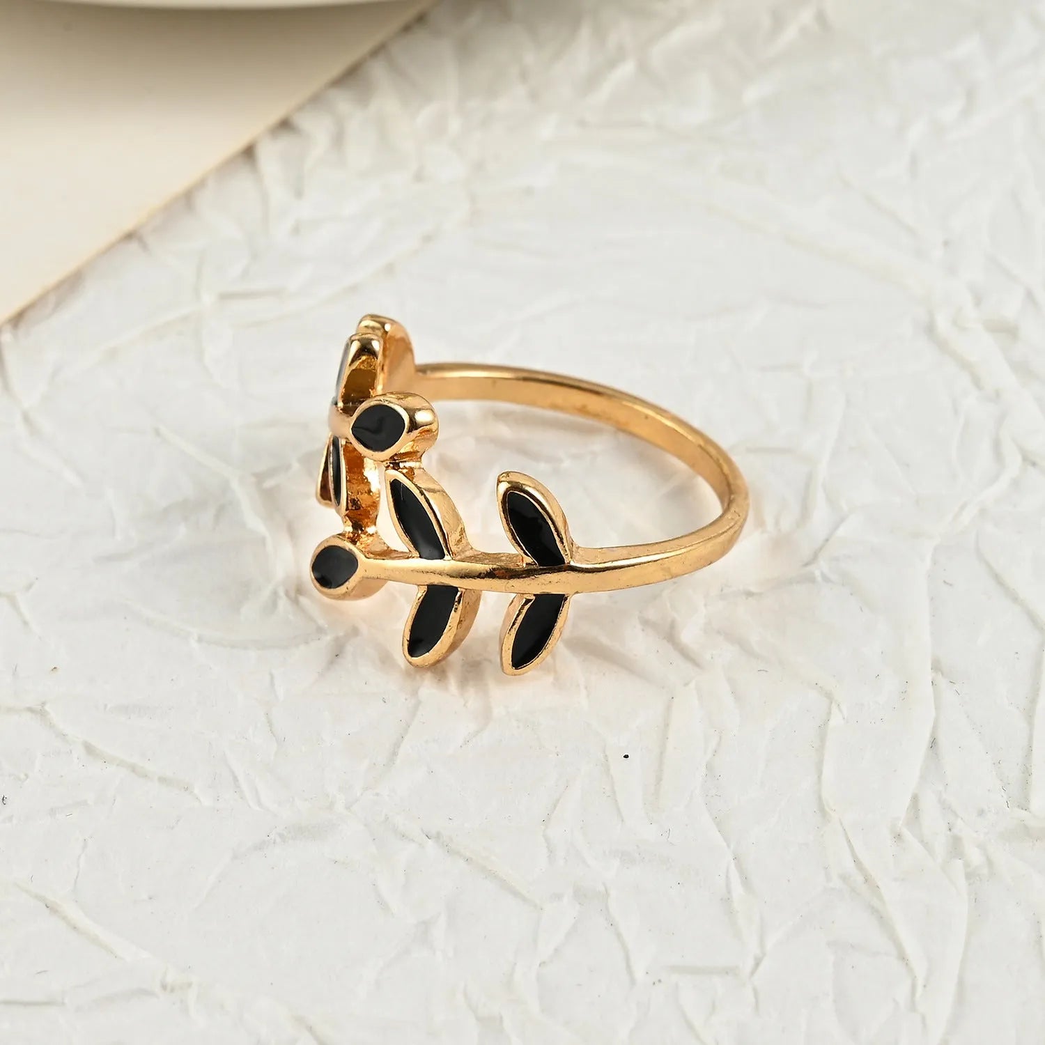 Gold electroplated acrylic ring with geometric leaf pattern for women's index finger