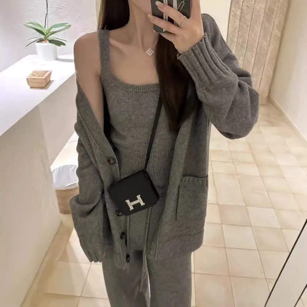 Women's light brown knitted cardigan, vest, and loose pants three-piece casual outfit set.
