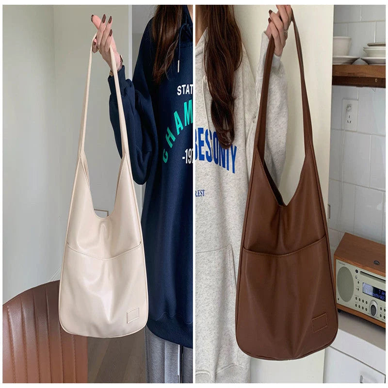 Large capacity PU tote bag for women in brown, black, and white with sewing thread detailing