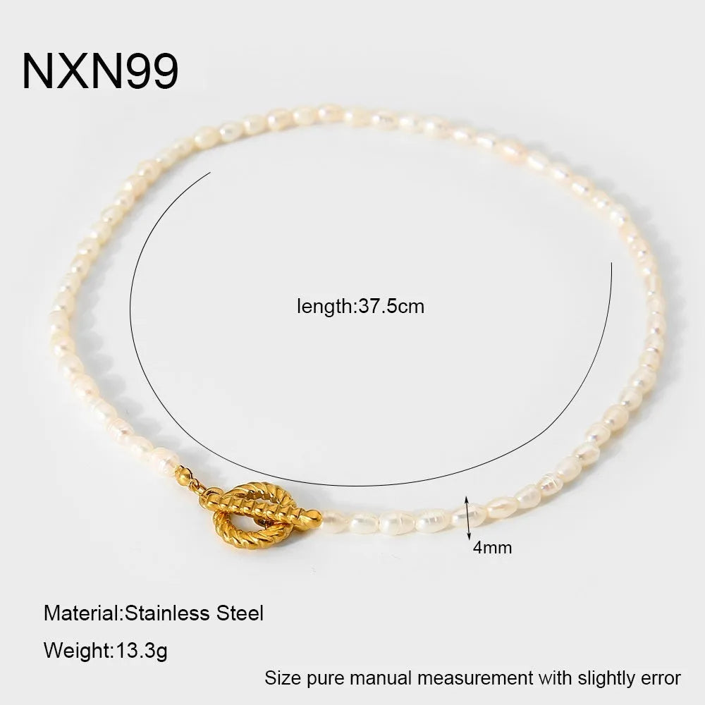 Freshwater pearl and stainless steel necklace bracelet set with geometric shapes on clavicle chain