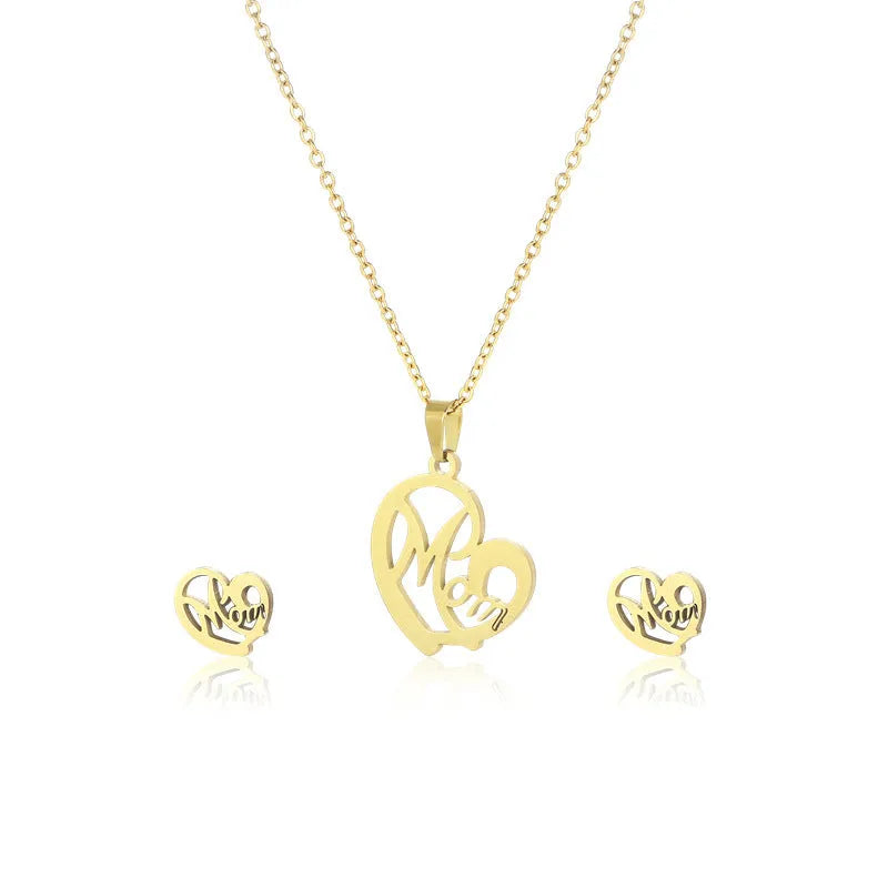 Stainless steel heart-shaped mom necklace and earring set in TZ-216 gold finish on display