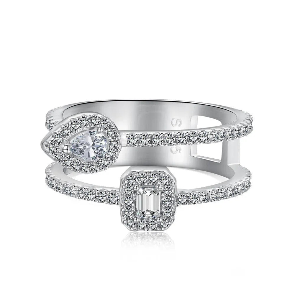 S925 sterling silver water drop double-layer hollow ring platinum finish geometric design on white background