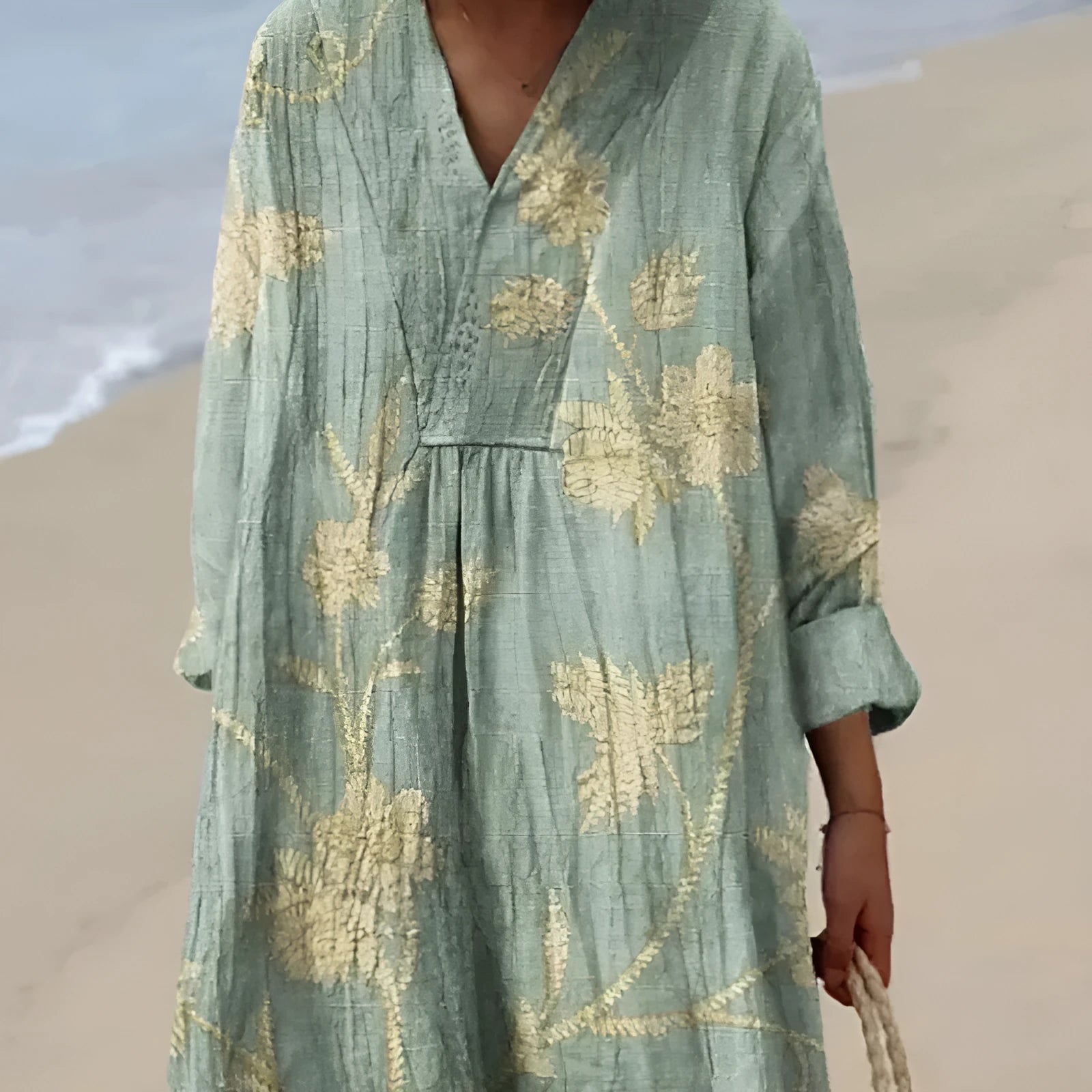 Casual long floral shirt dress with 3D print, wide waist, and regular sleeves on a hanger.