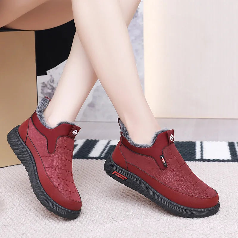 Women's black casual flat boots with round toe and rubber sole