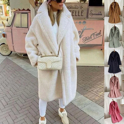 Women's lapel lamb fleece coat with faux fur lining and pockets for winter warmth