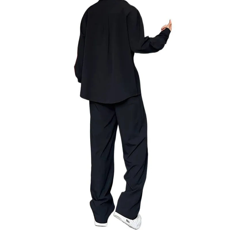 Men's black slim fit long sleeve polo shirt and matching trousers casual two-piece set.