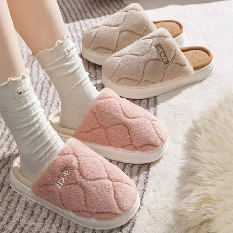 Cozy plush slippers with soft, plush upper material and durable PVC sole for comfortable and secure indoor wear