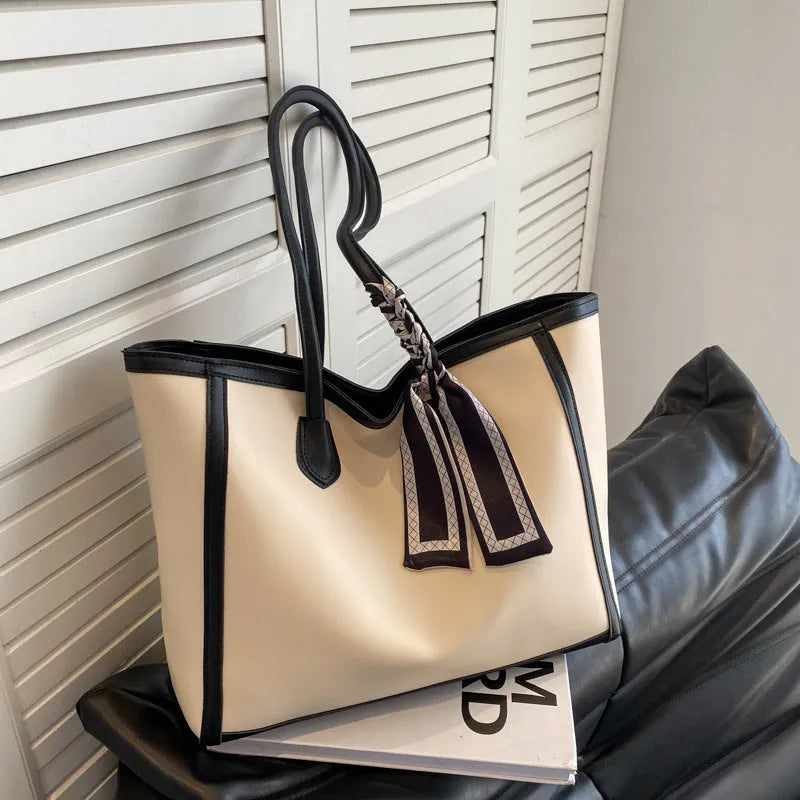 Soft black PU leather horizontal tote shoulder bag with an open outer pocket