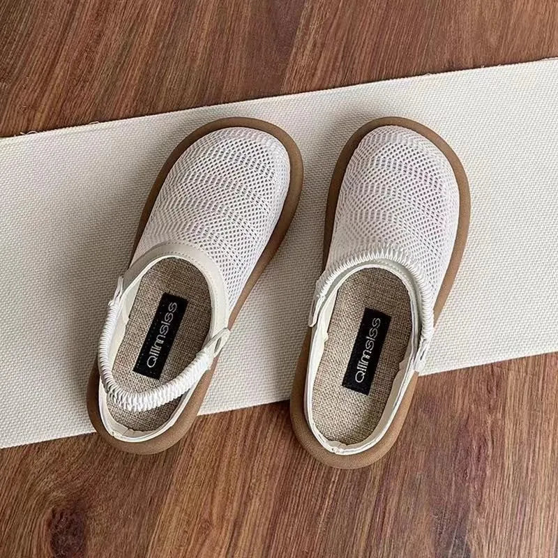 Breathable mesh slip-on shoes in beige with a round toe and low-top design on a rubber sole.
