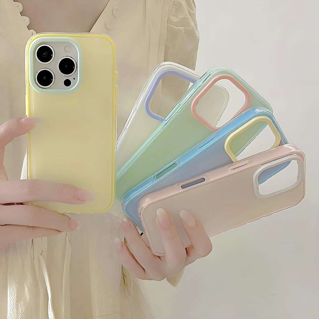 Clear jelly iPhone phone case in solid blue colour on an iPhone, showing bumper-style all-inclusive protection.