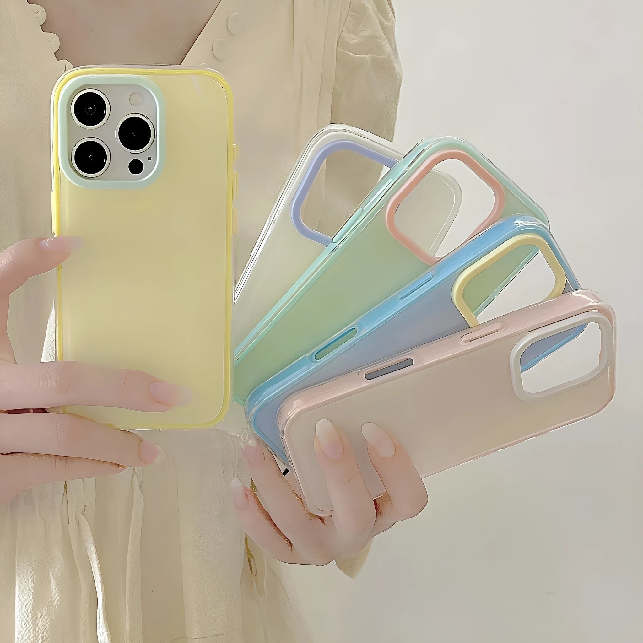 Clear jelly iPhone phone case in solid blue colour on an iPhone, showing bumper-style all-inclusive protection.