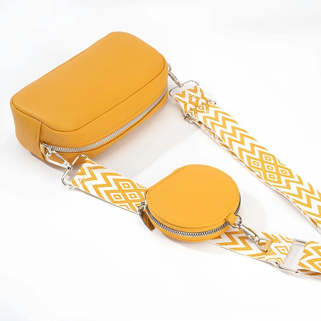 Women's soft PU crossbody bag in horizontal square shape showing internal zipper pocket and eight colour options