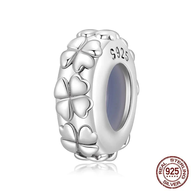 Four-leaf clover shaped S925 sterling silver spacer bead with pearlescent finish, 1.0cm height