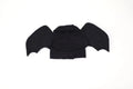 Black polyester bat wings costume accessory for a dog on chest and back.