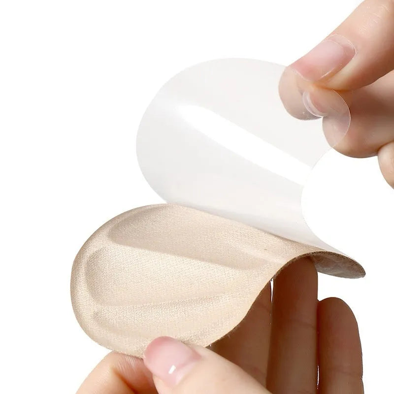 Three pairs of camel-coloured anti-slip heel cushion pads with clip-style design
