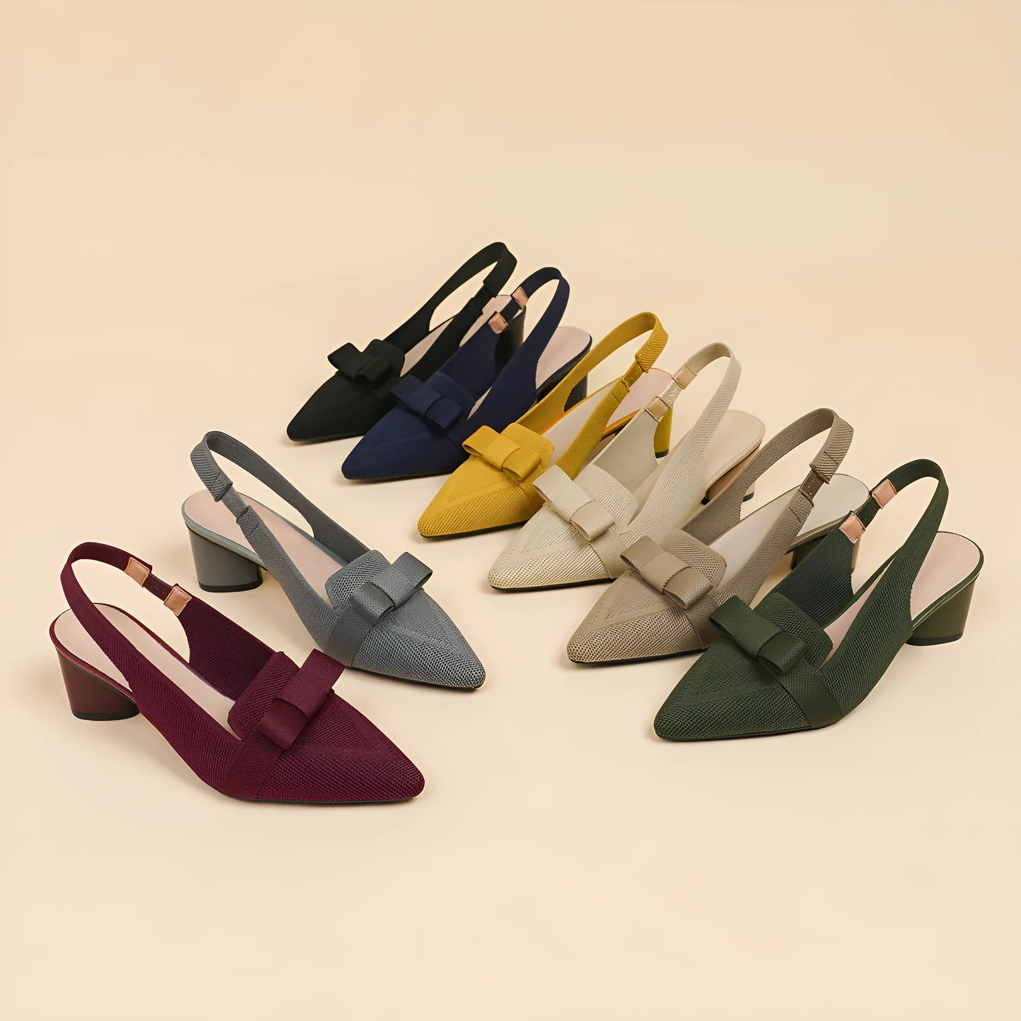 Women's closed toe high heel sandals with bow detail and ankle buckle back strap in solid summer colours