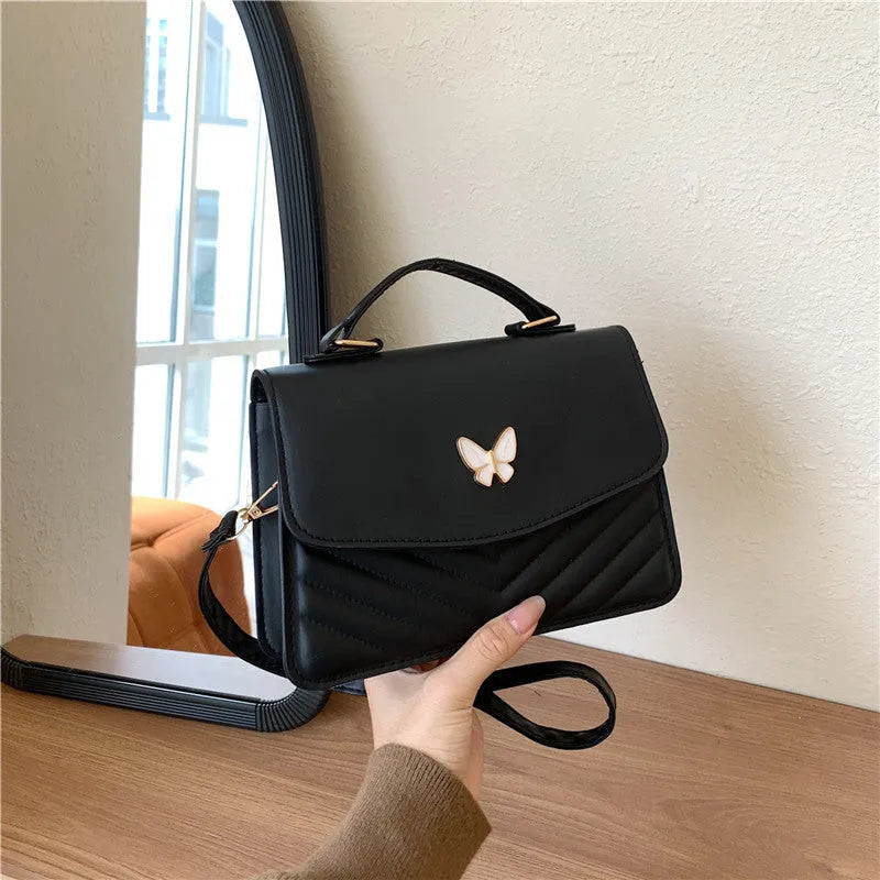 Women's PU horizontal square handbag with bow detail in dark blue colour option