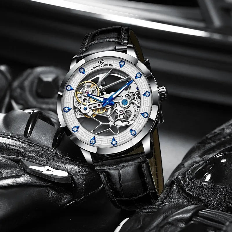 Men's silver mechanical watch with white dial, blue luminous hands, and a black leather strap