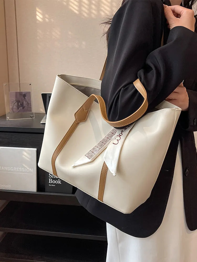 Women's large capacity tote shoulder bag in multiple colour options showing bucket design with sandwich pocket
