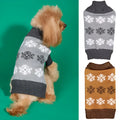 Dog wearing Christmas sweater with snowflake pattern in dark brown and grey colours