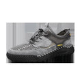 Men's brown suede casual tennis shoes with elastic band and hand-stitched details.