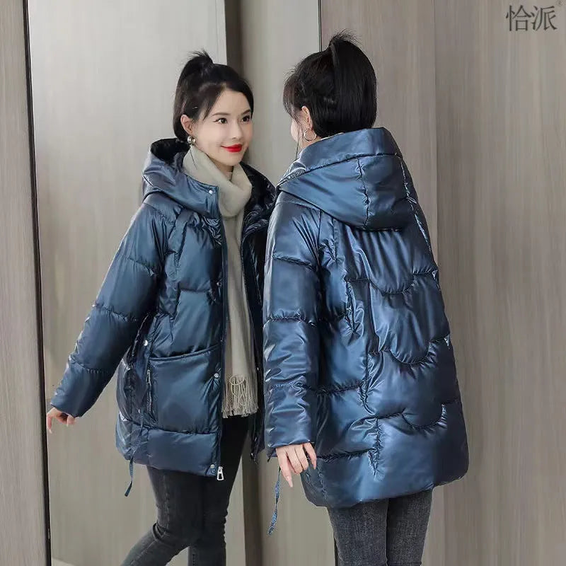 Women's loose thick hooded winter jacket in black, shown on a hanger.
