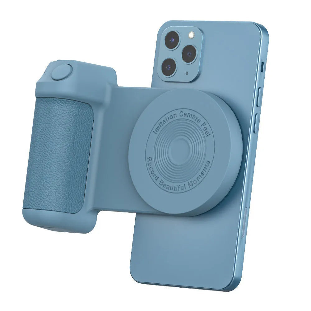 Black magnetic 3-in-1 phone camera grip and stand with ergonomic handle on a table