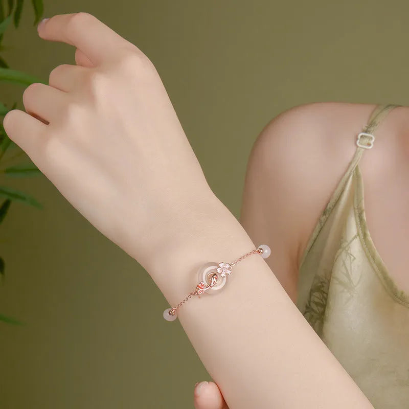 S925 sterling silver bracelet with white chalcedony crystals and koi design