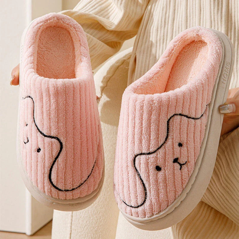 Cozy cat-themed slippers with plush uppers and non-slip rubber soles, available in a variety of vibrant colors