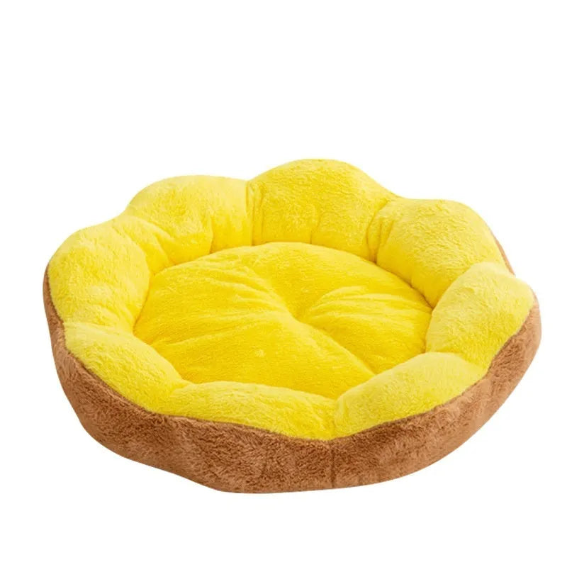 A thick round rabbit plush pet bed in a soft colour, shown detached for washing.