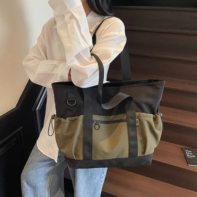 Women's lightweight grey yoga fitness travel bag with letter pattern and 36-55L capacity