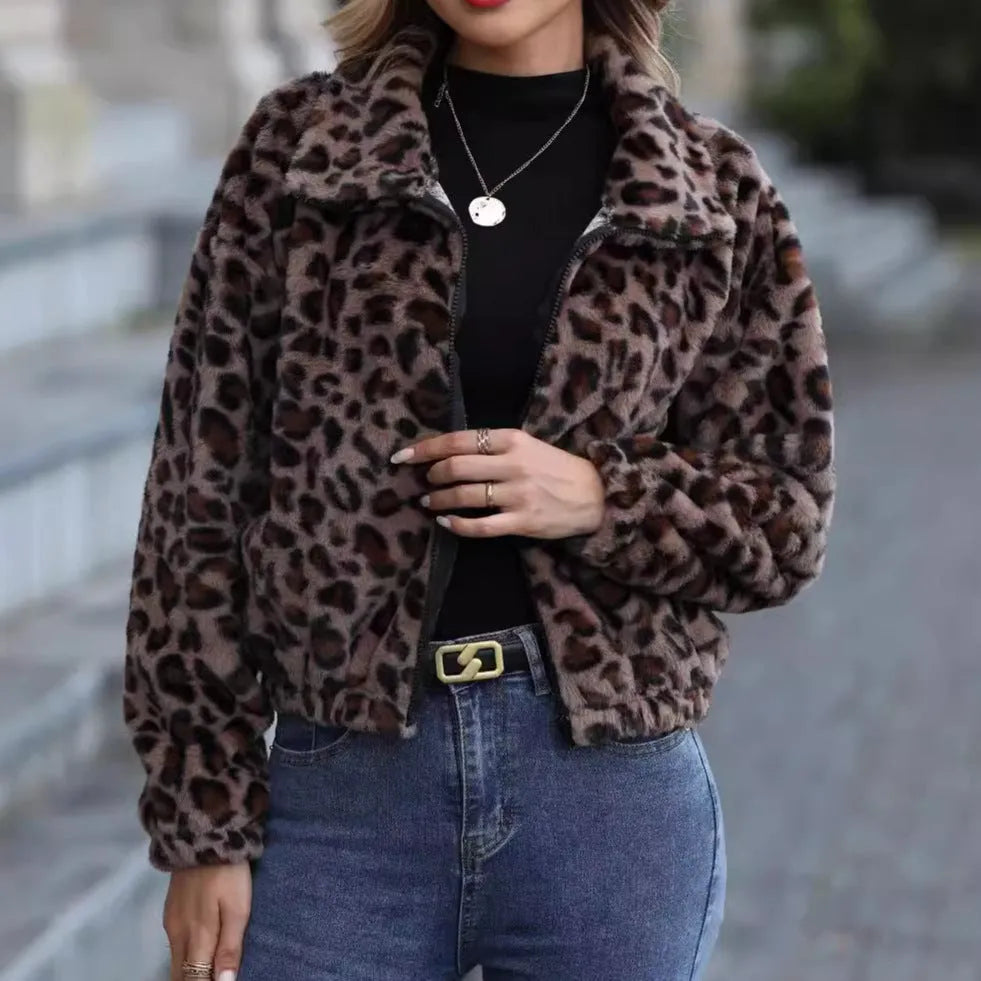 Women's loose fit leopard print plush coat with long raglan sleeves and a full zip.