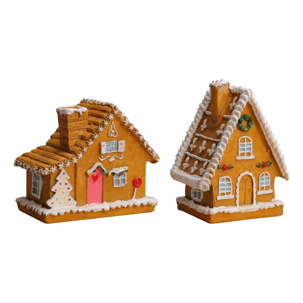 Christmas resin small house micro landscape with warm LED glow on tabletop