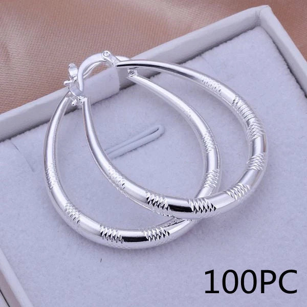 Silver-plated copper hoop earrings with 925 silver treatment, 3.9cm by 3.2cm