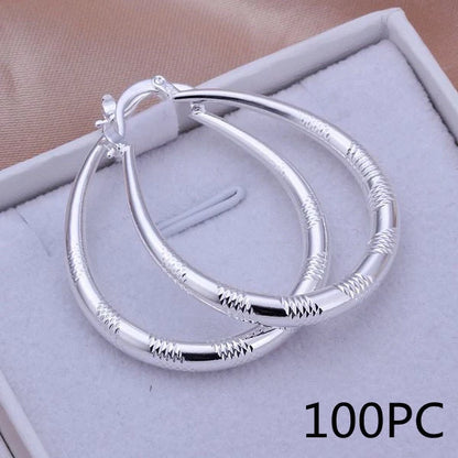 Silver-plated copper hoop earrings with 925 silver treatment, 3.9cm by 3.2cm