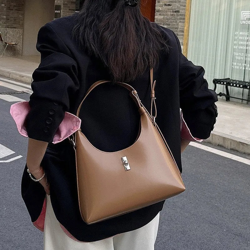Genuine leather dumpling-shaped crossbody bag with mobile phone compartment in apricot colour
