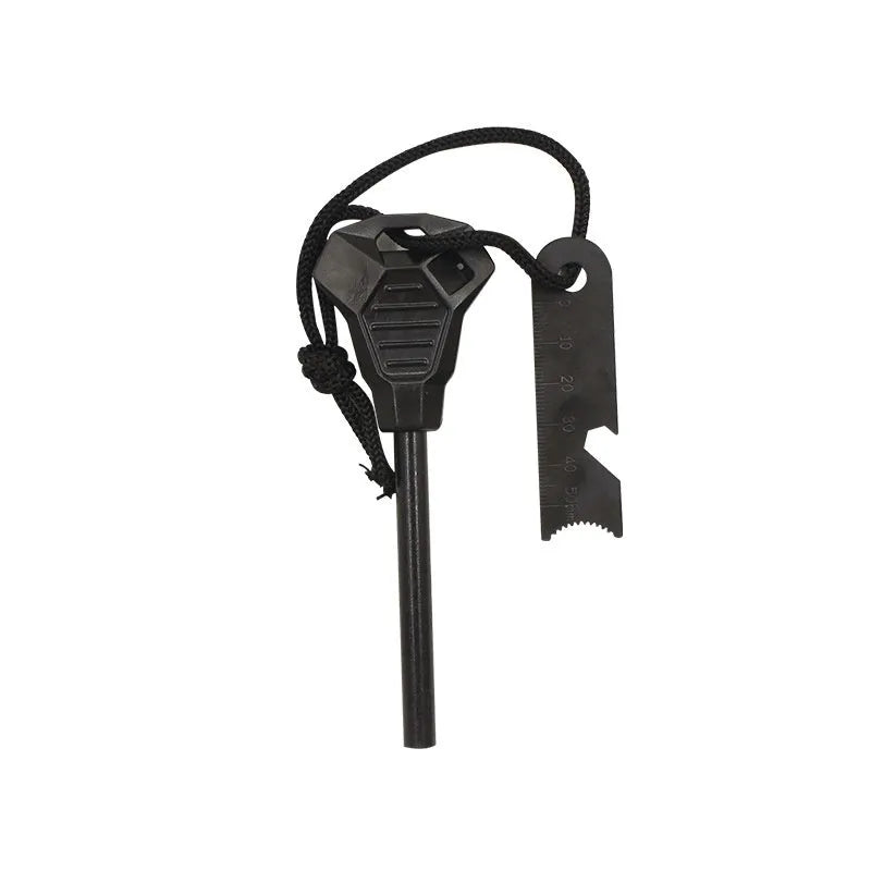 Black outdoor multifunctional flint tool with magnesium rod, steel scraper, whistle, and bottle opener.
