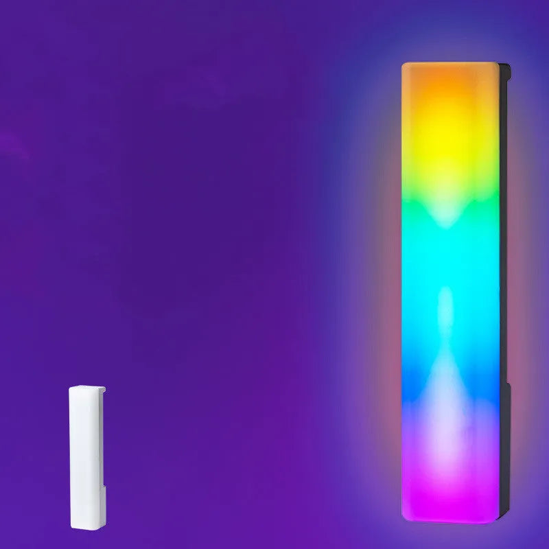 3D RGB voice-activated ambience lamp in black or white on a gaming desk.