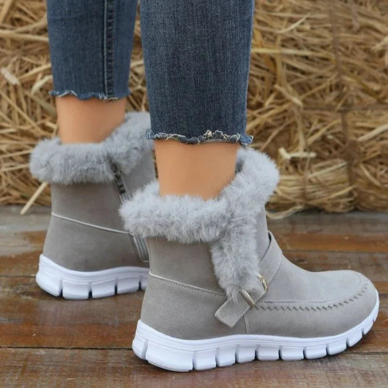 Plush snow boots with suede upper, rubber sole, and artificial fur lining for women's winter wear