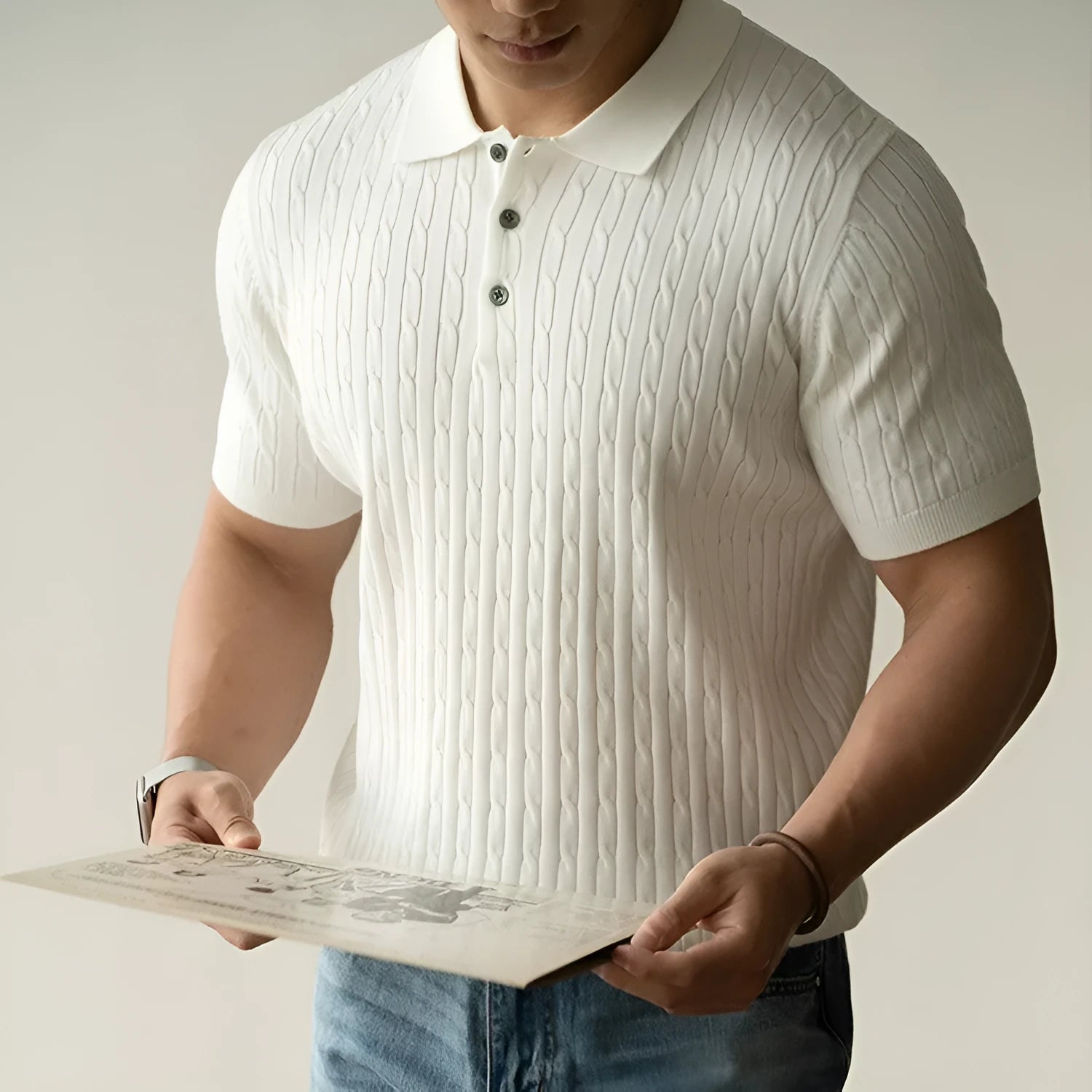 Men's khaki short sleeve business top laid flat, showing collar and sleeve detail.