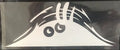 Large rectangular self-adhesive body sticker on skin, showing colourful smiley face design measuring 19cm by 7cm.