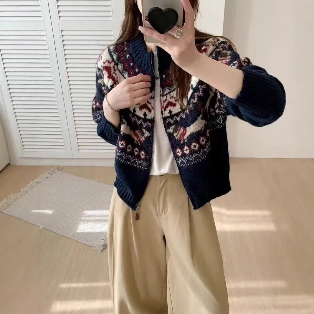 Ethnic Jacquard pattern pullover sweater with 3D effect in loose fit.