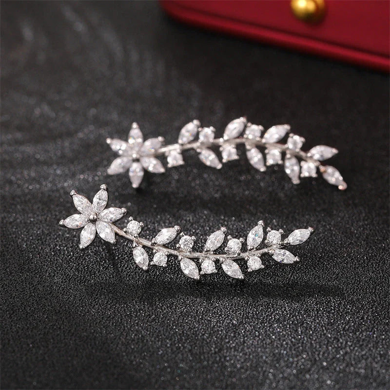 Floral diamond earrings for women in white gold, gold, and rose gold finishes