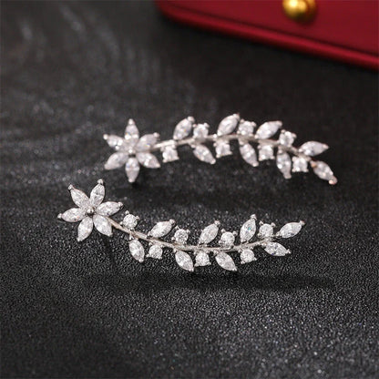 Floral diamond earrings for women in white gold, gold, and rose gold finishes