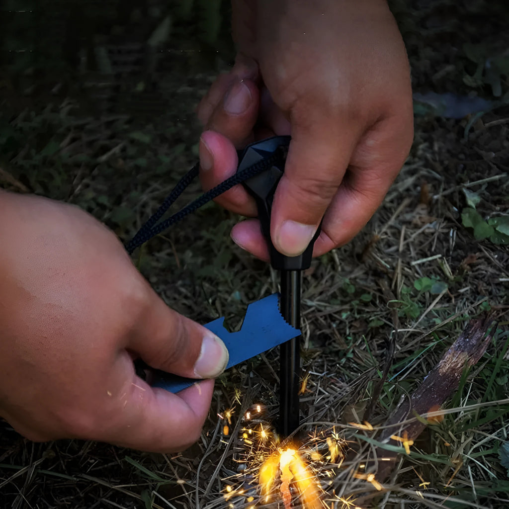 Black outdoor multifunctional flint tool with magnesium rod, steel scraper, whistle, and bottle opener.