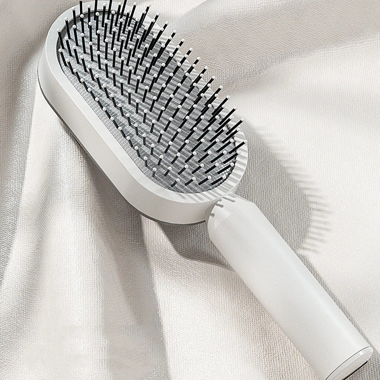 3D Air Cushion Hair Brush in elegant white, showcasing wide comb teeth and ergonomic handle
