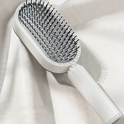 3D Air Cushion Hair Brush in elegant white, showcasing wide comb teeth and ergonomic handle