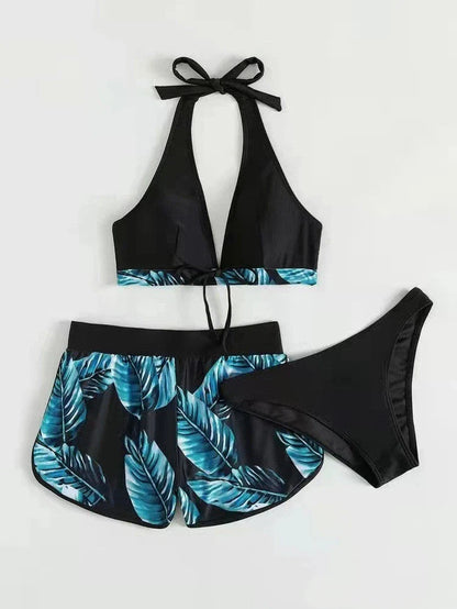 Chic leaf-patterned women's swimsuit set with bikini top, bottoms, and matching shorts in various vibrant colors