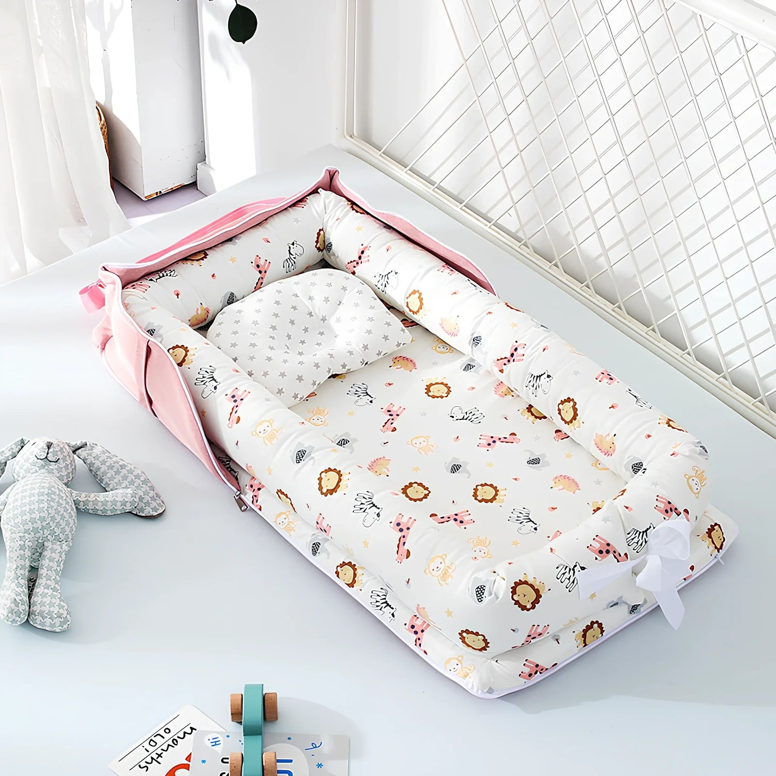 Foldable cotton portable baby crib in Animal World Blue, 90x50 cm with pillow and strap, weighing 1.3 kg