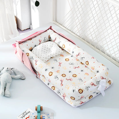 Foldable cotton portable baby crib in Animal World Blue, 90x50 cm with pillow and strap, weighing 1.3 kg